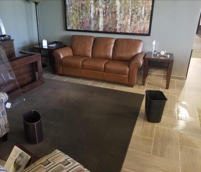 water on the floor of a living room 