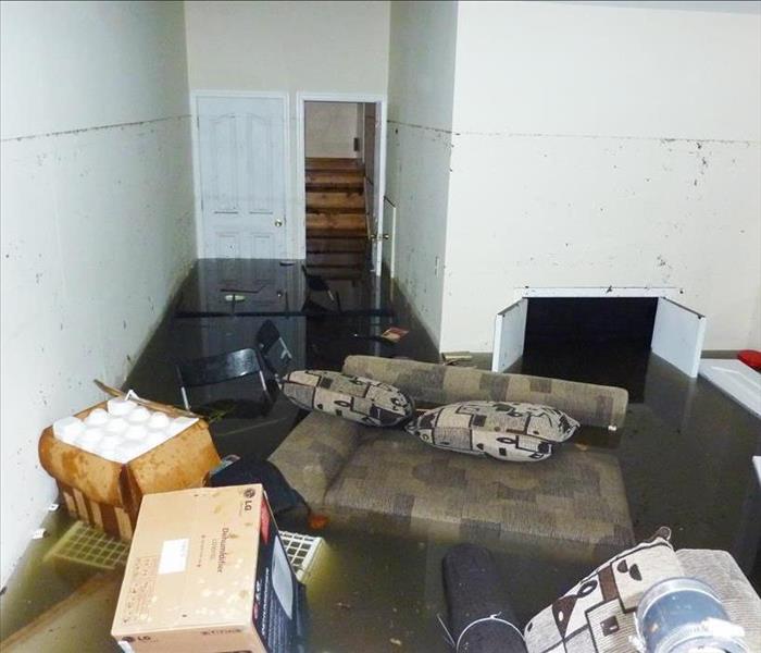 Completely flooded basement. A visible line is showing maximum water level higher than 7 feet.